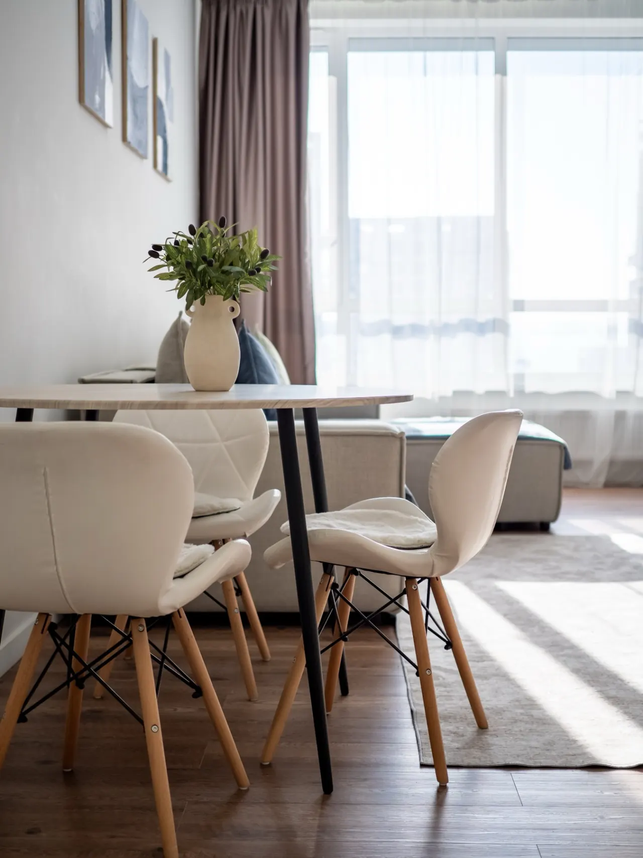 Dining table for four beside the living area