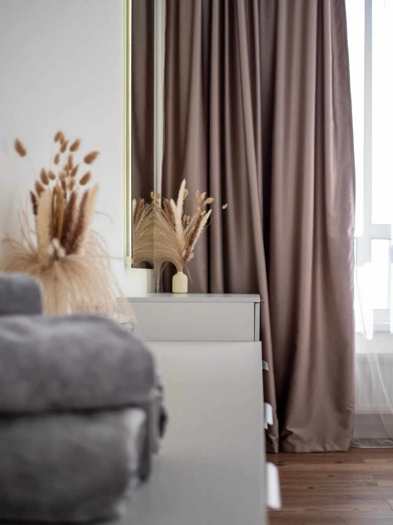 Blackout curtains and dried-flower styling
