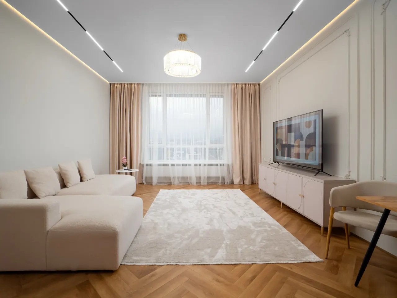 Modular sofa facing the framed television
