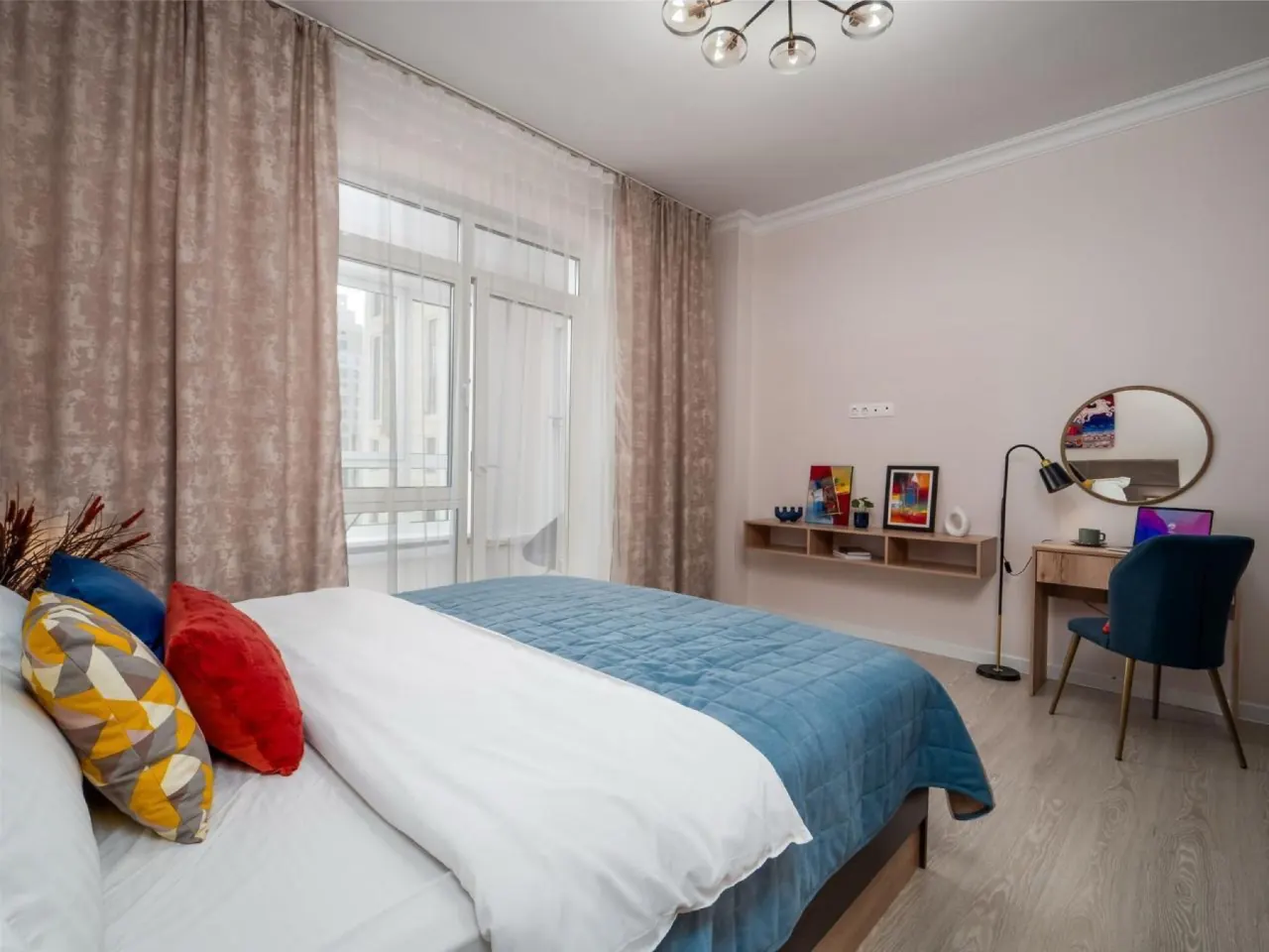 Bedroom with double bed and dressing table