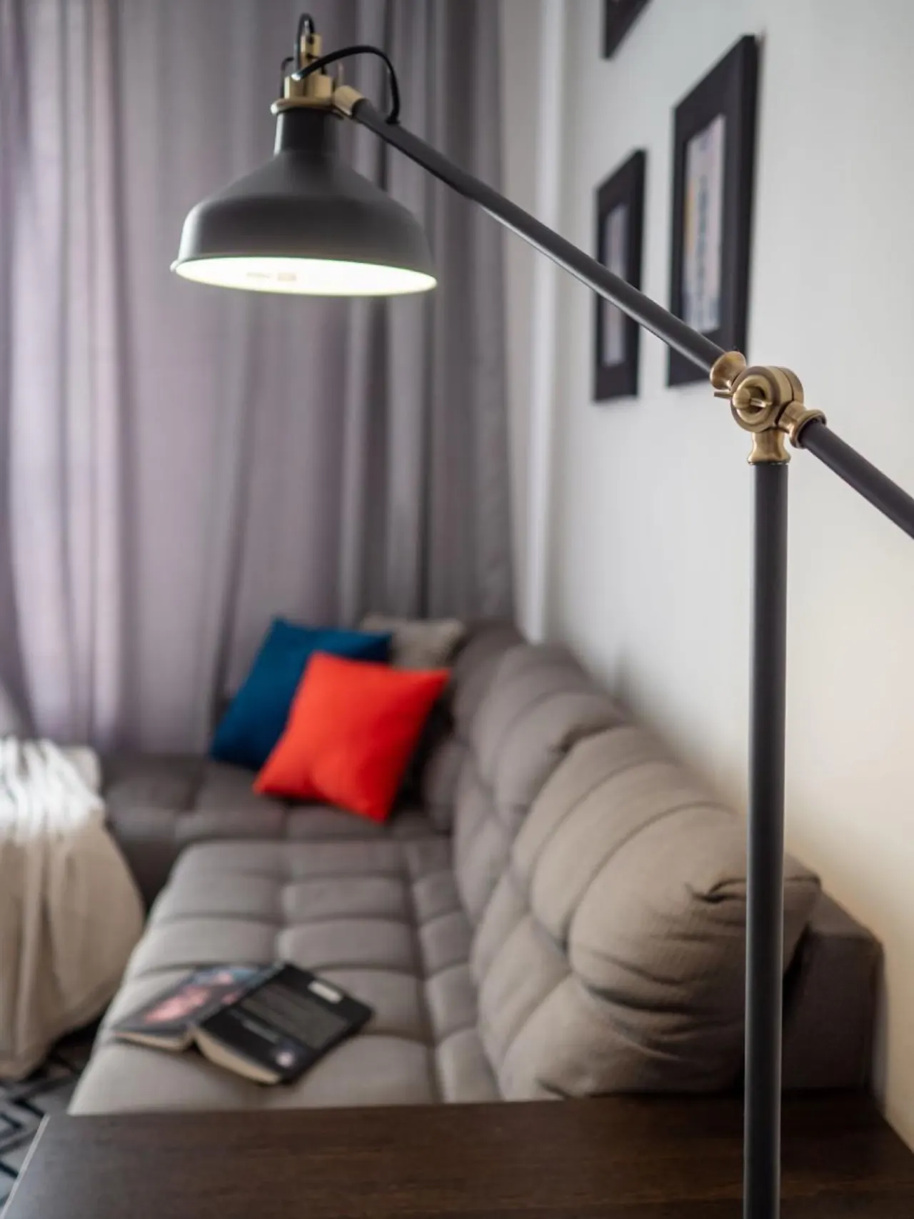 Brass floor lamp beside the sofa